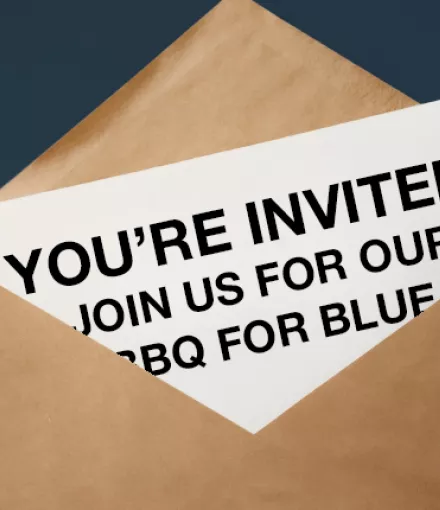 BBQ for Blue invitation in an envelope