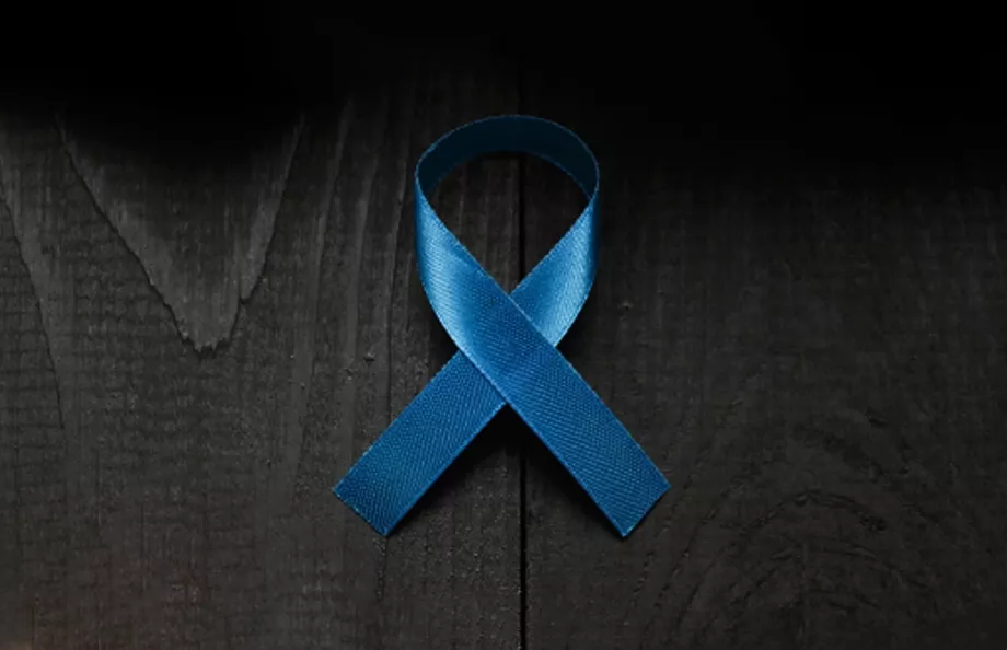 Blue ribbon on black wood