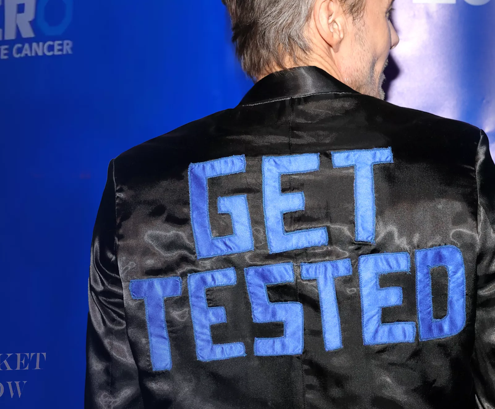 Fashion Show man with Get Tested Jacket on