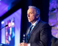 Ted Healy accepting a Bold For Blue award at an award ceremony for Zero Prostate Cancer