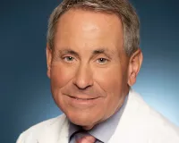 Middle-aged male doctor in a white coat