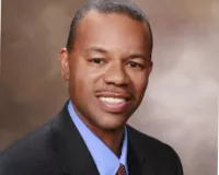 African American man in a dark suit
