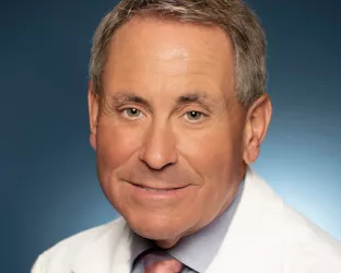 Middle-aged male doctor in a white coat