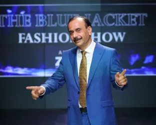 Johnson & Johnson spokesperson wearing a blue suit