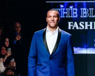 NYC Meteorologist, Mike Woods, walking the runway