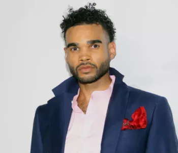 African American man in a blue suit, Kris Bennett