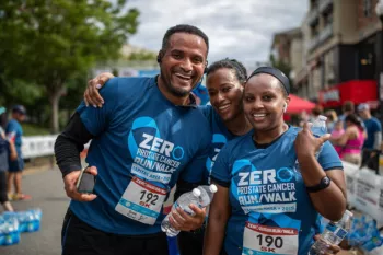 Family hugging at run/walk