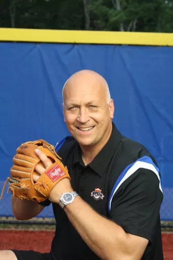 Cal Ripken Jr holding a football
