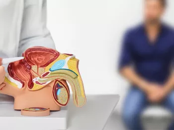 A man sitting at a urology office