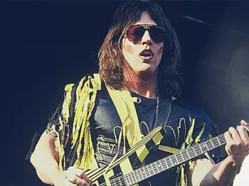 Young Jay Jay French playing guitar at a concert