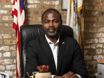 Illinois Rep. La Shawn Ford sitting at his desk