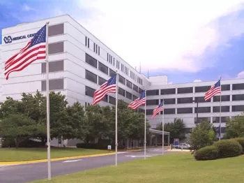 a Veterans Administration Medical Center with American flags 