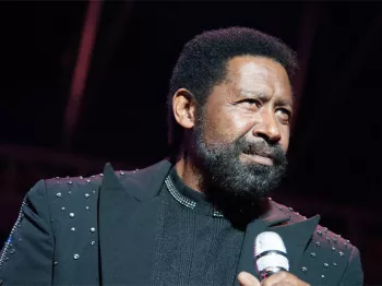 William King holding a microphone