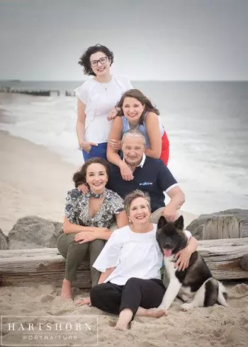 Bogdanos' Family photo on the beach with their dog too