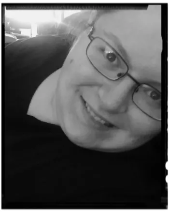 Young woman with eye glasses posing in front of a camera