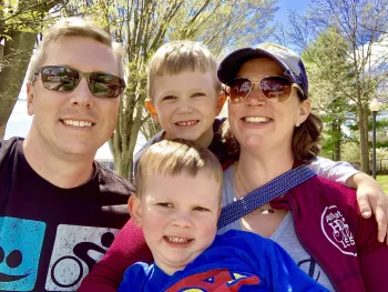 The Tyler Myers family smiling around a camera for a selfie