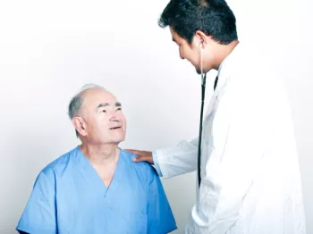 Cancer patient looks at doctor for new cancer vaccine ideas