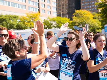 New York Run/Walk attendees high-fiving