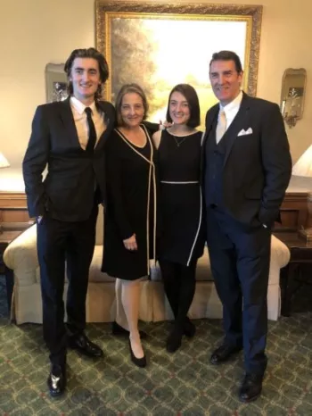 Patrick Boll and his family dressing dapper to the nines in all black