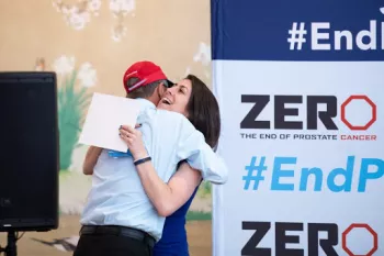 Randy and Vanessa sharing a hug at the podium at Bold For Blue Awards 2020