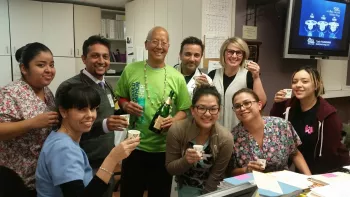 Randy's oncology team toasting Randy's 15th and last Taxotere session