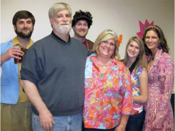 Katie Leary, her father and family standing for a casual family photo