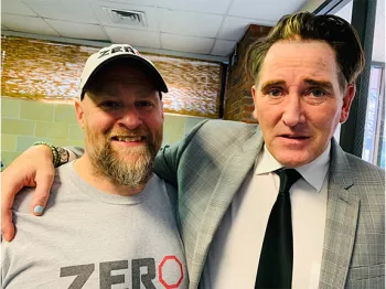 Kevin Schlehuber andJamie Bearse standing arm over shoulder