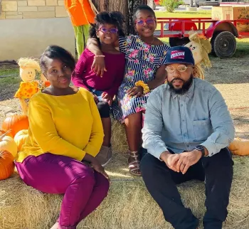 Mical Roy and Family at a fall festival