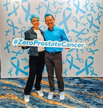 Photo of Brandy and Leo Nunes holding ZERO Prostate Cancer sign