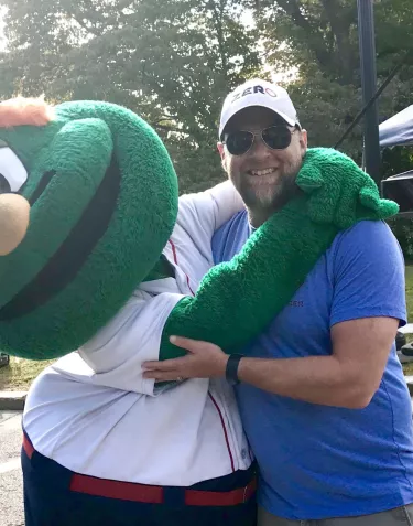 New England Chapter  Jamie Bearse hugging Boston Mascot