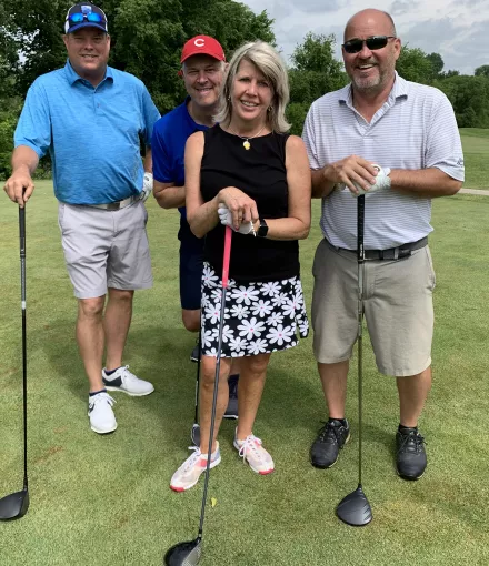 Group playing golf