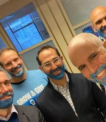 Office workers with blue beards for Grow and Give