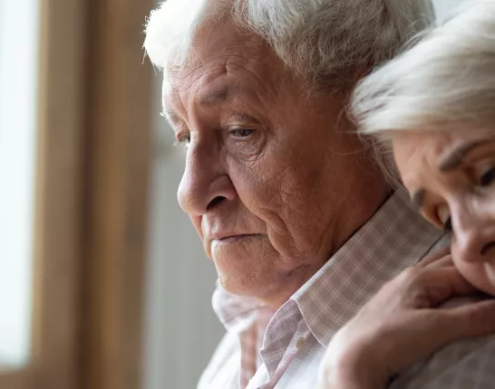 Mature distressed white couple
