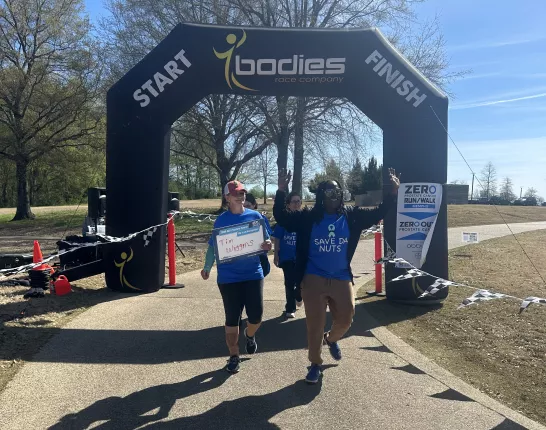 Crossing the finish line at the ZERO Prostate Cancer Run/Walk