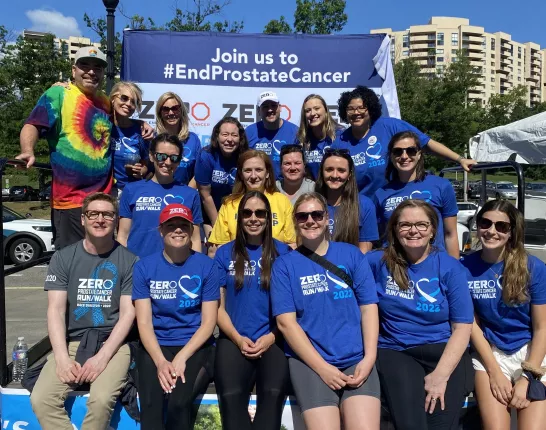 Group of ZERO staff members in blue t-shirts