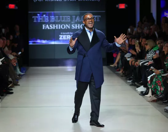 Man in blue jacket on fashion runway Tyrone Brewer Janssen's president of U.S. oncology took to the runway for the first time