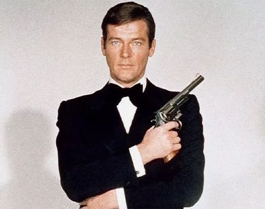 Actor Roger Moore dressed as James Bond