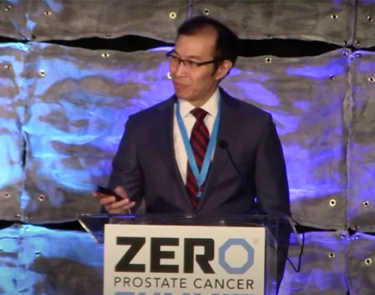 Dr. Eric Shinohara speaking at the 2023 Summit