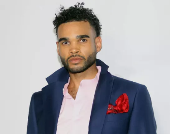 African American man in a blue suit, Kris Bennett