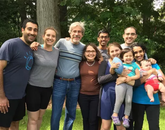 Leshin family standing together in a yard