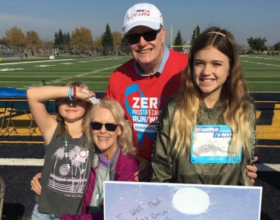 Grandparents with their two granddaughters