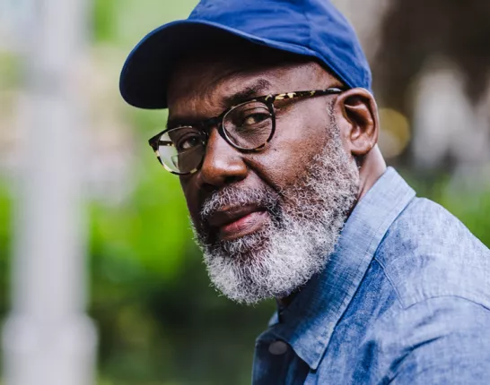 African American man looking into camera