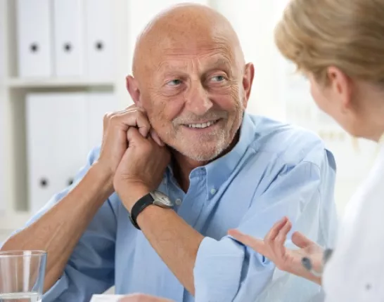 Man Talking to His Healthcare Provider about Prostate Cancer Treatment Options