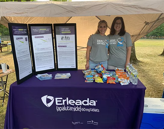 Two representatives of Erleada at a tabling event