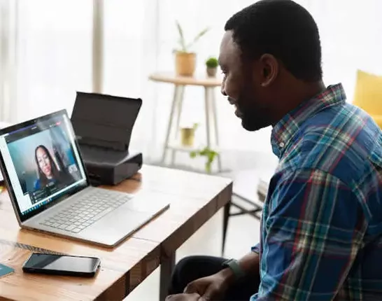 Middle aged man on a video chat with someone