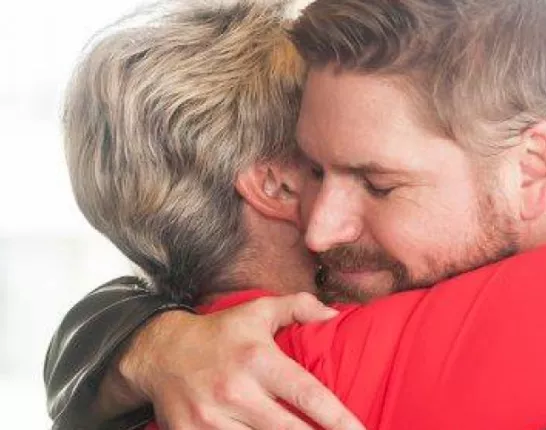Two people hugging