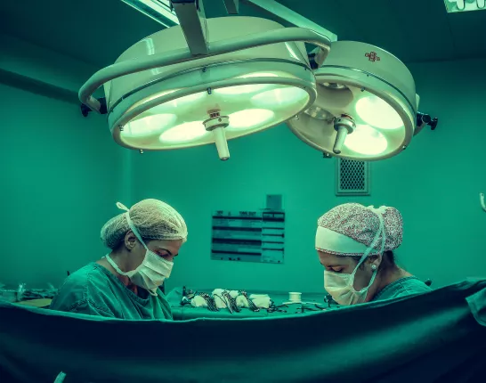 Two surgeons performing a surgery