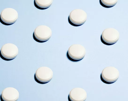 White Pills with blue background