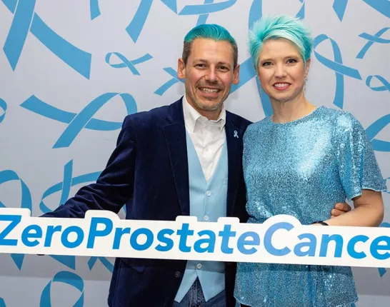 social media preview - couple holding sign