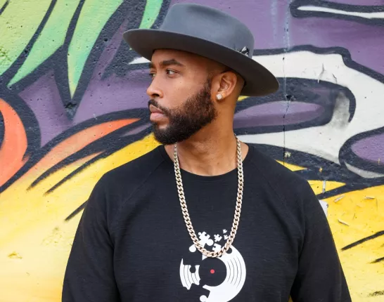 Montell Jordan Standing in Front of Mural